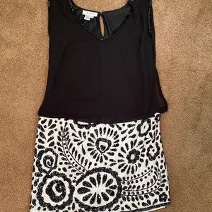 Black top, B/W sequin bottom dress size 14